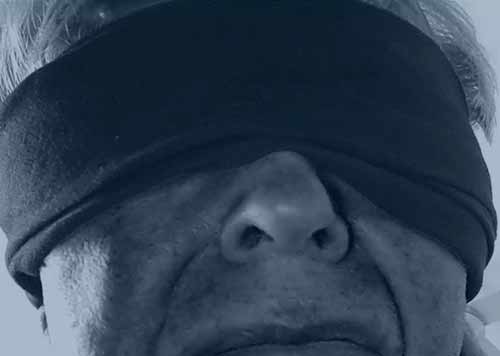 blindfolded man